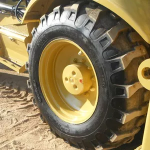 Шины на экскаватор погрузчик  Caterpillar Cat (Кат) 