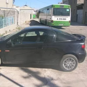 Продам Opel-tigra 1999 г.,  1.4,  черный металлик,  в отл. состоянии